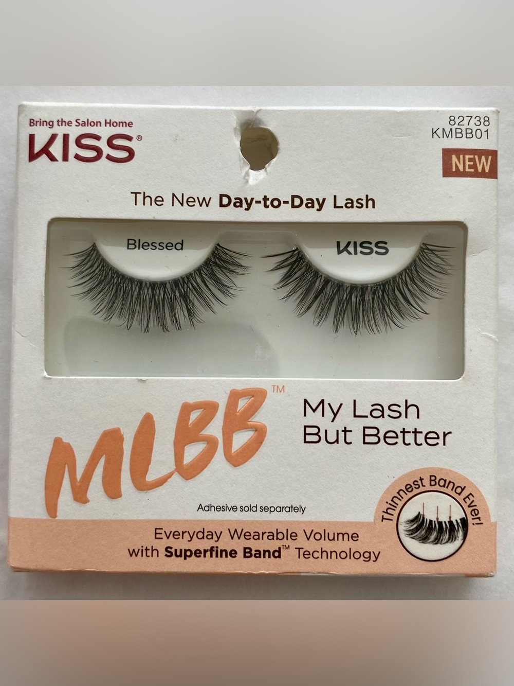 Kiss False Lashes in Black with Peach Accent Packaging